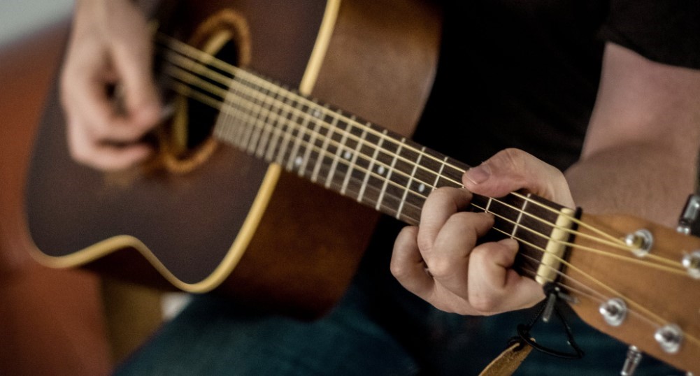 How Long Does It Take To Learn Guitar? (How To Learn Fast) - Business